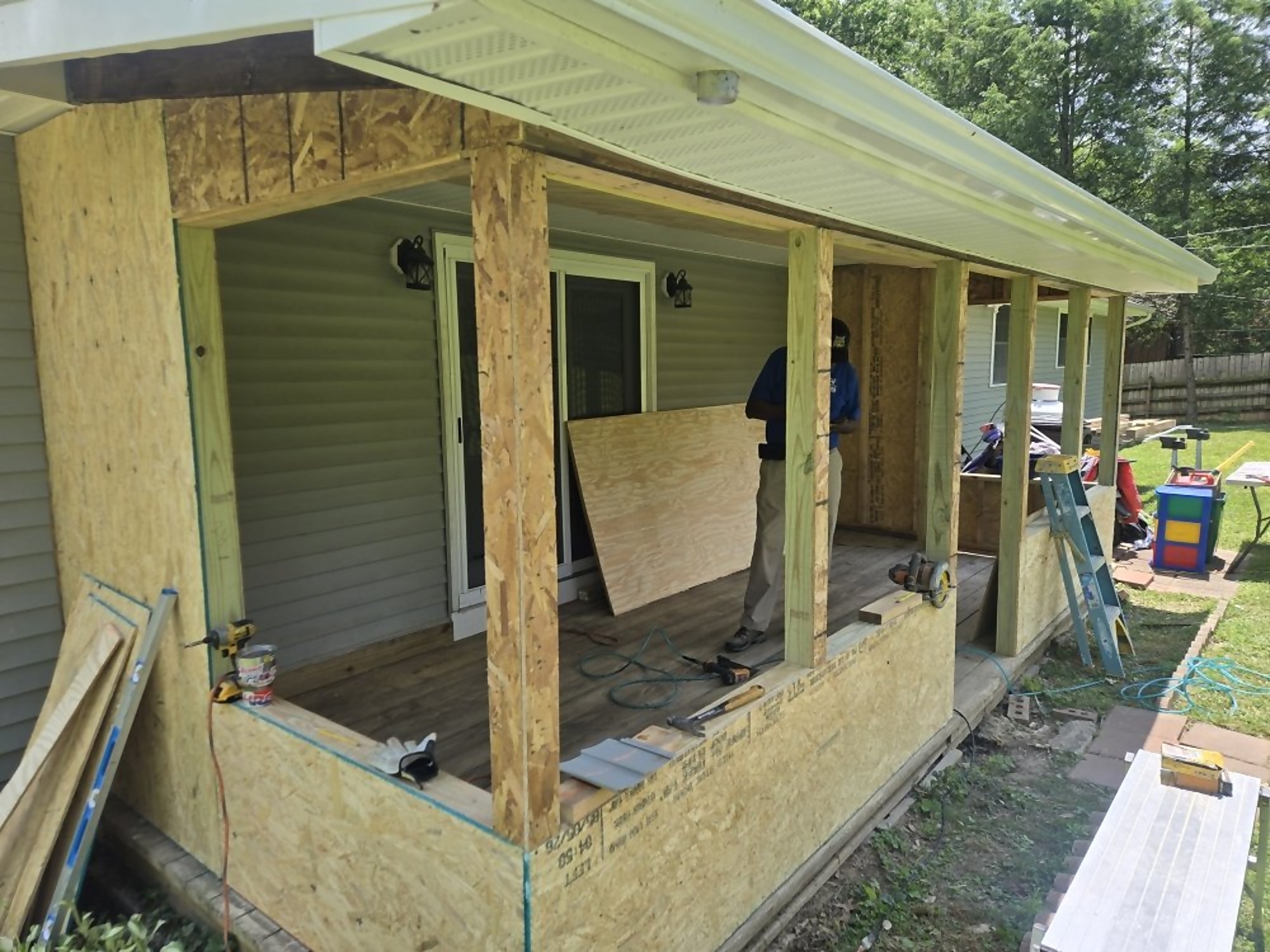 Framing and sheathing stage of a Pro One porch enclosure project